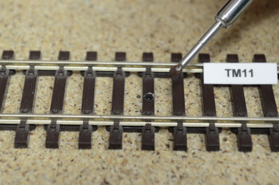 Opravný tmel pro zakrývání děr v kolejových pražcích, hnědá 4, 15g